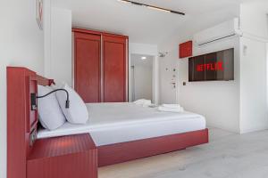 Postel nebo postele na pokoji v ubytování Tulii Rooms