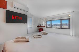 Postel nebo postele na pokoji v ubytování Tulii Rooms