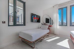 TV a/nebo společenská místnost v ubytování Tulii Rooms