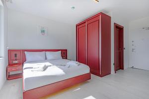 Postel nebo postele na pokoji v ubytování Tulii Rooms