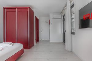 Postel nebo postele na pokoji v ubytování Tulii Rooms