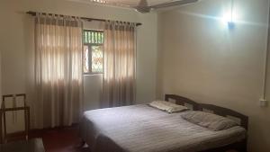 Postel nebo postele na pokoji v ubytování Villa96c,Kandy