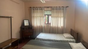 Postel nebo postele na pokoji v ubytování Villa96c,Kandy