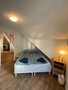 Ένα ή περισσότερα κρεβάτια σε δωμάτιο στο Harmony Apartments - By Honivi Gruppen