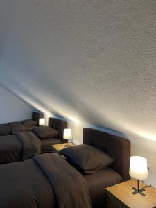 A bed or beds in a room at Apartmani Ćosić - Kuršumlijska banja