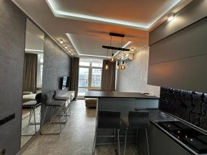 Зона вітальні в Arcadia apartment & sea terrace