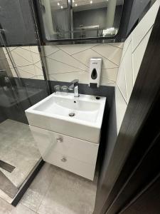 Ванна кімната в Arcadia apartment & sea terrace