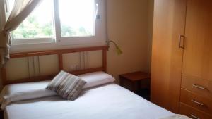 Postel nebo postele na pokoji v ubytování Holiday Home Cardona + 37 fotografií