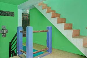 Fotografie z fotogalerie ubytování SPOT ON 92400 Dhaha Penginapan House Syariah v destinaci Kediri + 18 fotografií
