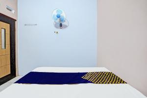 Katil atau katil-katil dalam bilik di Hotel O Sobat Ijen HomestayNearSungai Prengsengan
