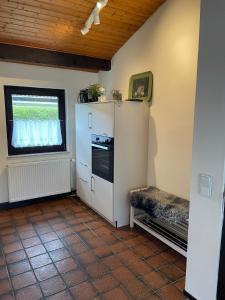 Foto dalla galleria di H5 Haus Schwalbennest Kaminofen WLAN a Butjadingen