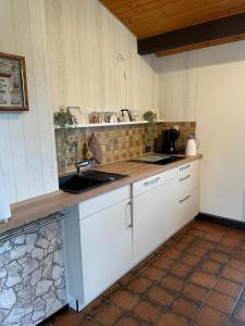 Foto dalla galleria di H5 Haus Schwalbennest Kaminofen WLAN a Butjadingen