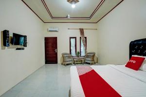 Фотография из галереи Hotel O Efniati Homestay Syariah в городе Payakumbuh
