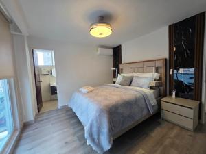 Postel nebo postele na pokoji v ubytování Elegant Spacious Apt on the Cinta Costera N#9
