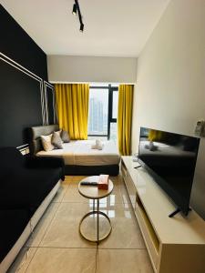 TV a/nebo společenská místnost v ubytování Residensi Akson Bukit Bintang Axon nearby Pavilion TRX