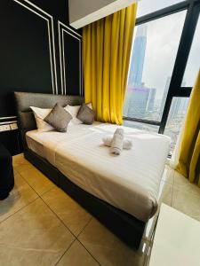 Postel nebo postele na pokoji v ubytování Residensi Akson Bukit Bintang Axon nearby Pavilion TRX + 37 fotografií