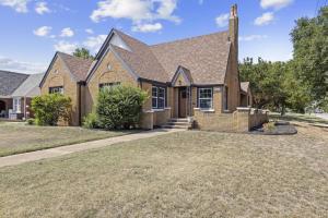 a home with a brick house at New 4 Br, Okc, Walk 2 Ou Med, Sleeps 8, 4 King Bed in Oklahoma City