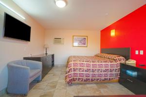 Postel nebo postele na pokoji v ubytování Vali Ho Motel By OYO Weslaco Mercedes