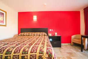 Postel nebo postele na pokoji v ubytování Vali Ho Motel By OYO Weslaco Mercedes