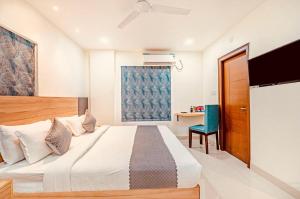 Postel nebo postele na pokoji v ubytování Hotel Jupiter At Delhi Airport + 7 fotografií