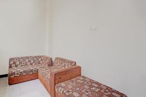 Χώρος καθιστικού στο Hotel O Solo near Solo Safari formerly RR Guesthouse