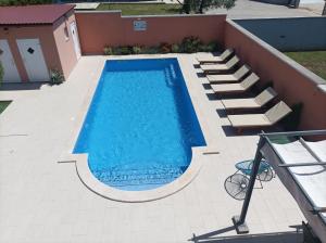 Bazén v ubytování House Monte Cherpo nebo v jeho okolí