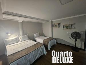 Katil atau katil-katil dalam bilik di HOTEL ONIX - Centro, Belo Horizonte