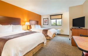 Ένα ή περισσότερα κρεβάτια σε δωμάτιο στο My Place Hotel-Billings, MT