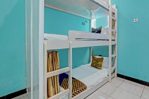 Μία ή περισσότερες κουκέτες σε δωμάτιο στο Hotel O Lobak Hostel CapsuleNearAyam Goreng Terowongan