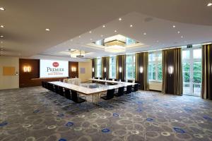 a conference room with a long table and chairs at Best Western Premier Park Hotel & Spa in Bad Lippspringe +76 photos