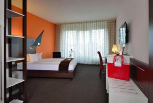 Postel nebo postele na pokoji v ubytování Best Western Plus Konrad Zuse Hotel