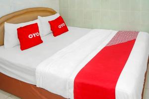 Postel nebo postele na pokoji v ubytování OYO 92678 Hotel Melati + 20 fotografií