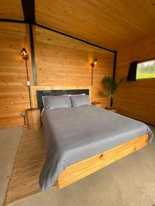Voodi või voodid majutusasutuse Taikú Ecolodge toas
