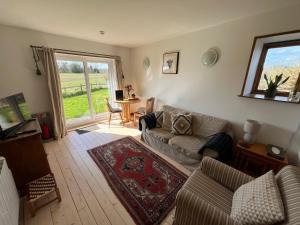Istumisnurk majutusasutuses Stable Cottage by Roslin Glen