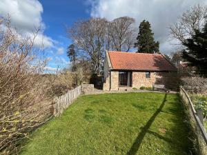 Giardino di Stable Cottage by Roslin Glen