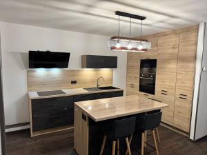 Η κουζίνα ή μικρή κουζίνα στο Maison Dinan centre +4 φωτογραφίες