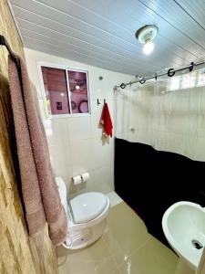 Koupelna v ubytování Mini Kitnet perfeito viajantes e executivos