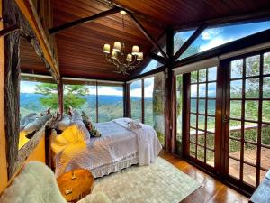 Cama ou camas em um quarto em Chalé Vista Privilegiada