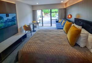 Letto o letti in una camera di Distinction Coachman Hotel, Palmerston North