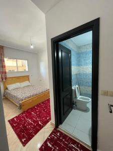 Postel nebo postele na pokoji v ubytování Sabah Appartment + 3 fotografie