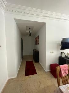 TV a/nebo společenská místnost v ubytování Sabah Appartment