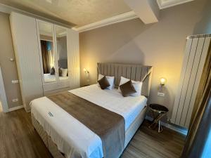 Postel nebo postele na pokoji v ubytování AVANGARDE SEA Luxury Apartments