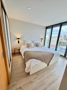 Postel nebo postele na pokoji v ubytování Square house