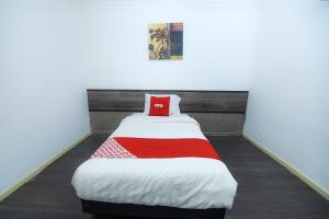 Postel nebo postele na pokoji v ubytování OYO 90820 River Inn