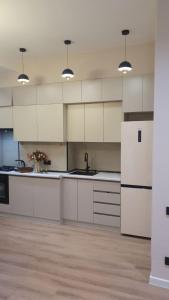 Køkken eller tekøkken på Комфорт и Уют