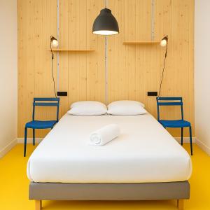 Postel nebo postele na pokoji v ubytování Koala Hostel Mercado