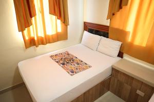 Postel nebo postele na pokoji v ubytování Hotel Adrinber