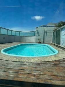 Bazén v ubytování Frente Mar Itaparica nebo v jeho okolí