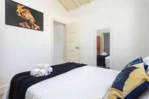 Ένα ή περισσότερα κρεβάτια σε δωμάτιο στο WB03 Casa confortável c/ Piscina- Seu Espaço Exclusivo +69 φωτογραφίες