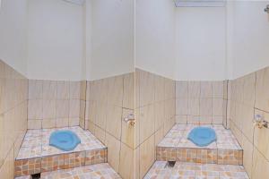 Letto o letti in una camera di SPOT ON 92934 Nusantara Syariah